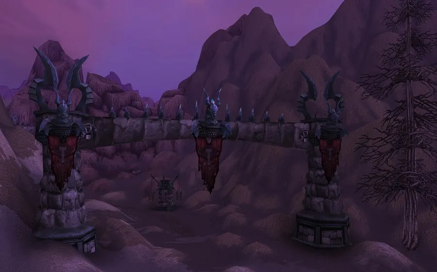 The entrance to Darkwhisper Gorge in Winterspring.